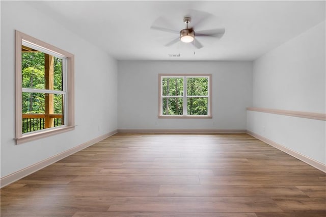 4786 Conns Creek Rd, Ball Ground, GA 30107 - unfurnished room featuring ceiling fan and wood finished floors