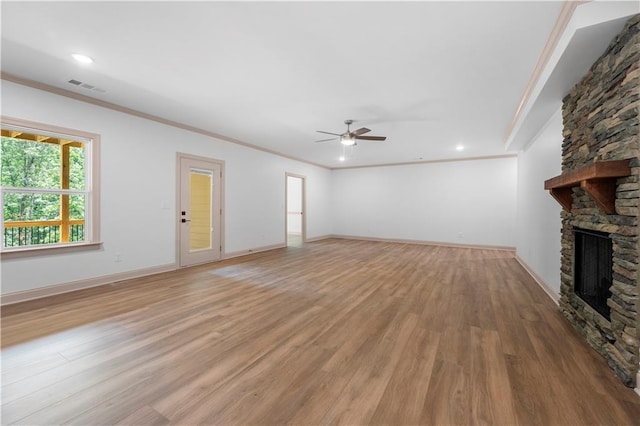 4786 Conns Creek Rd, Ball Ground, GA 30107 - unfurnished living room featuring a ceiling fan, crown molding, a fireplace, light wood finished floors, and recessed lighting