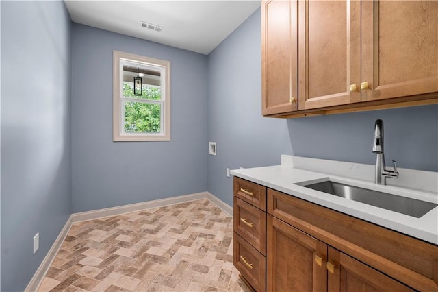 4786 Conns Creek Rd, Ball Ground, GA 30107 - laundry area featuring cabinet space, brick patterned floors, and washer hookup