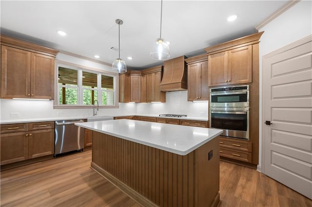4786 Conns Creek Rd, Ball Ground, GA 30107 - kitchen with appliances with stainless steel finishes, premium range hood, light countertops, a center island, and decorative light fixtures