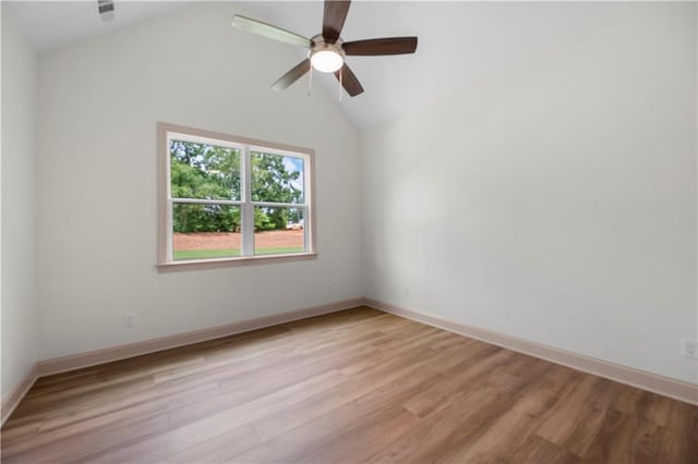4786 Conns Creek Rd, Ball Ground, GA 30107 - spare room featuring a ceiling fan, light wood finished floors, and vaulted ceiling