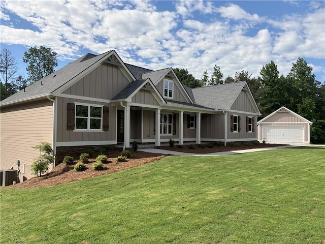 4786 Conns Creek Rd, Ball Ground, GA 30107 - view of front of property featuring an outbuilding, board and batten siding, a detached garage, and a front yard