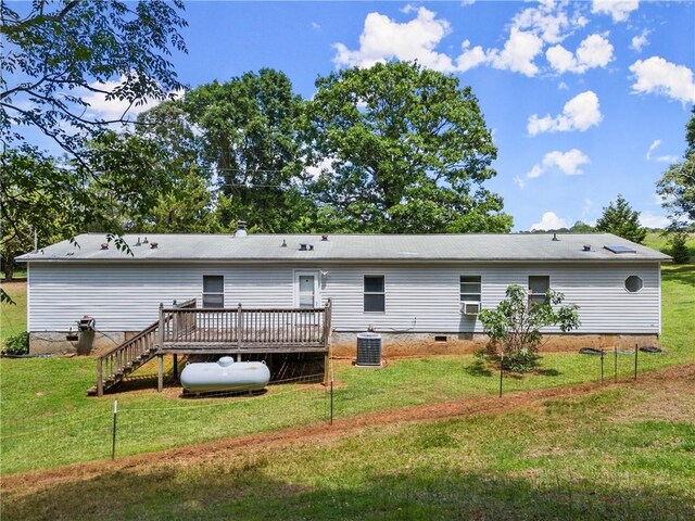 back of house with a wooden deck, central air condition unit, a lawn, and crawl space