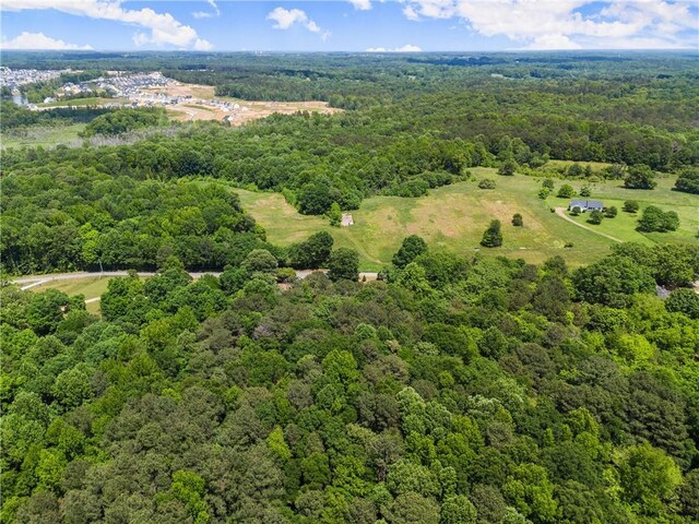 drone / aerial view of a heavily wooded area
