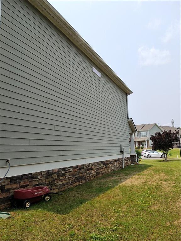 13 Mulberry Way, Cartersville, GA 30120 - view of side of property featuring a yard