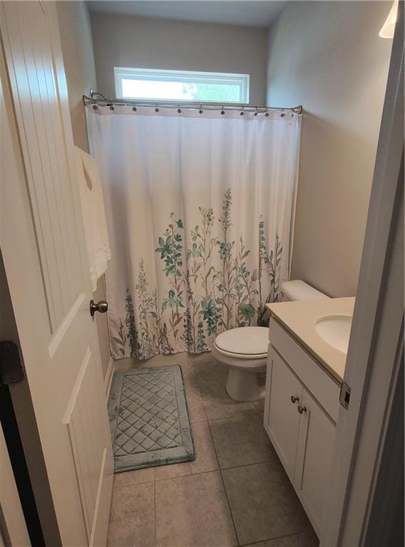 13 Mulberry Way, Cartersville, GA 30120 - bathroom featuring healthy amount of natural light, vanity, toilet, and tile patterned floors