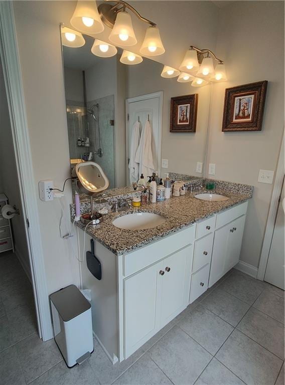 13 Mulberry Way, Cartersville, GA 30120 - full bathroom featuring double vanity, tile patterned flooring, tiled shower, and baseboards