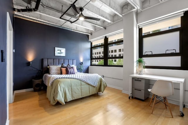 bedroom with light hardwood / wood-style floors