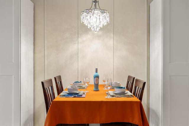 dining room with a chandelier