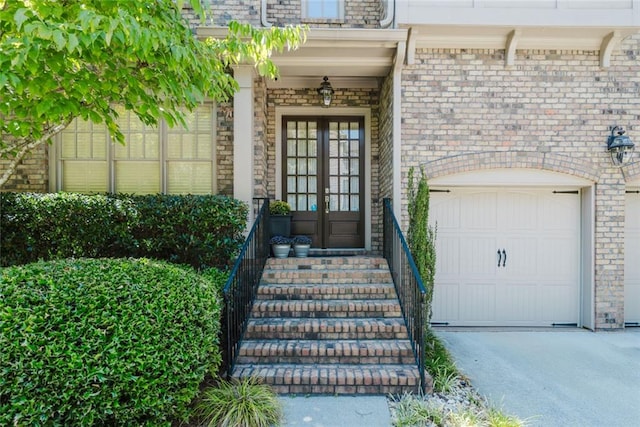 view of exterior entry featuring french doors