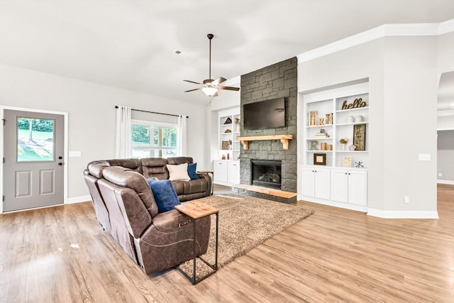 2980 Beards Rd, Buford, GA 30518 - living room with baseboards, a fireplace, ceiling fan, light wood finished floors, and crown molding