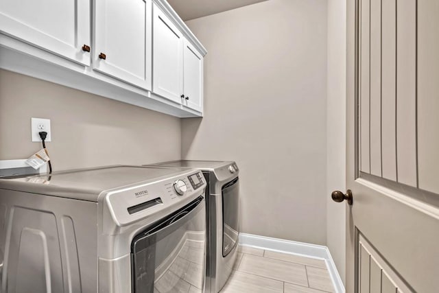 2980 Beards Rd, Buford, GA 30518 - laundry area with washer and dryer, cabinet space, and baseboards