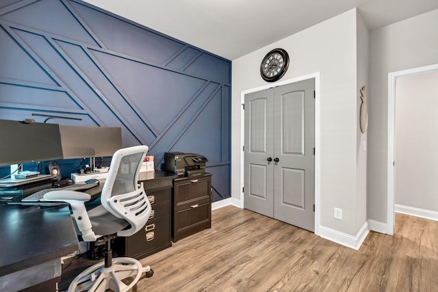2980 Beards Rd, Buford, GA 30518 - home office with baseboards and light wood-type flooring