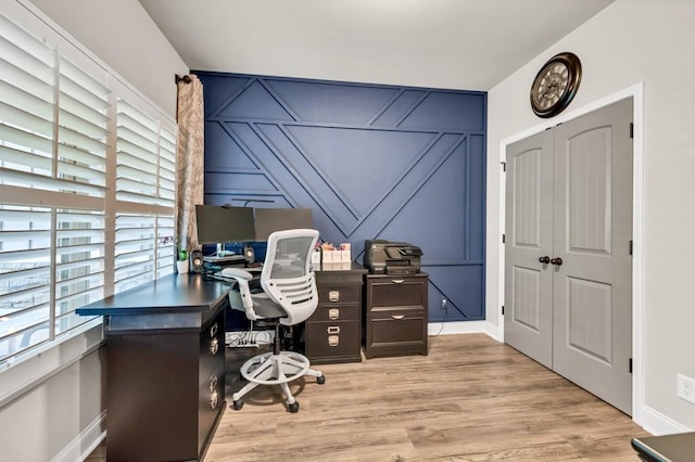 2980 Beards Rd, Buford, GA 30518 - office area featuring a decorative wall, wood finished floors, and baseboards