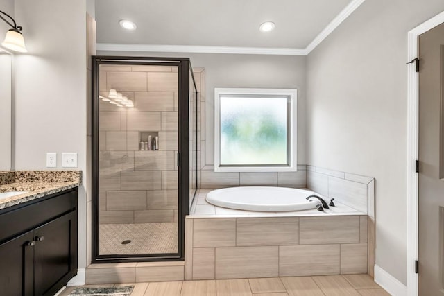 2980 Beards Rd, Buford, GA 30518 - full bathroom featuring a garden tub, a stall shower, vanity, crown molding, and recessed lighting