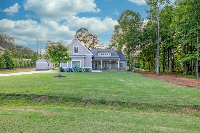 2980 Beards Rd, Buford, GA 30518 - view of front of house featuring a front yard, a porch, and board and batten siding