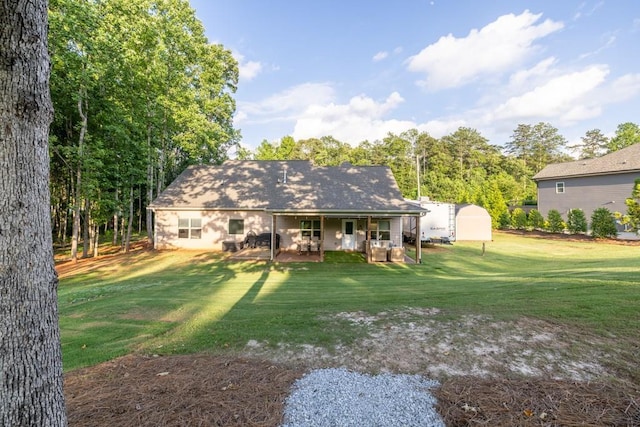 2980 Beards Rd, Buford, GA 30518 - rear view of house featuring a lawn