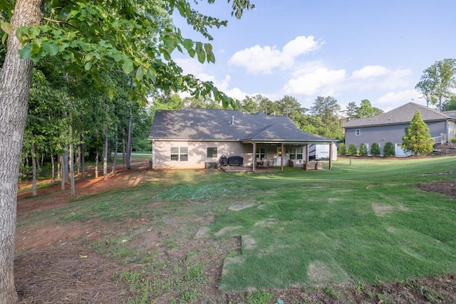 2980 Beards Rd, Buford, GA 30518 - rear view of house featuring a yard and a patio