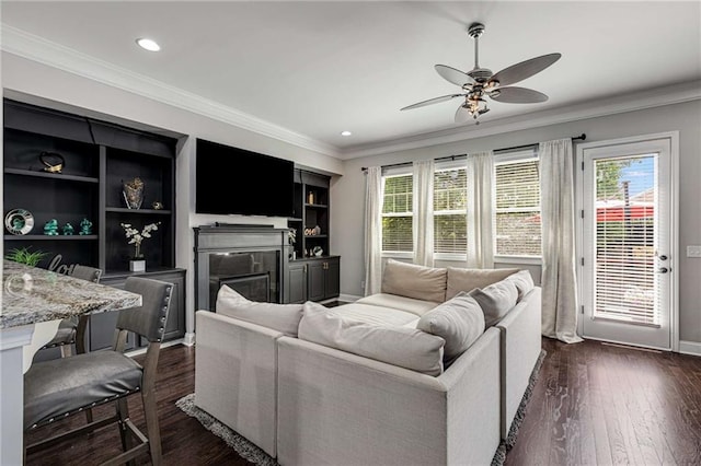 living room with plenty of natural light, recessed lighting, and ceiling fan