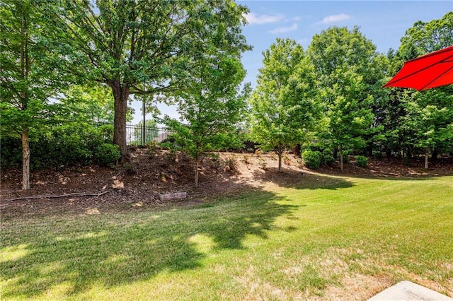 view of yard with fence