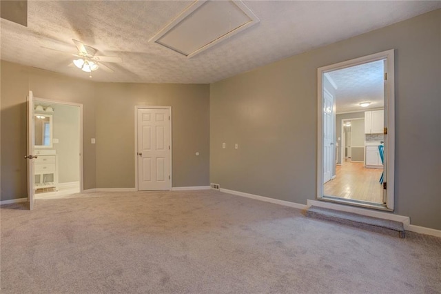 kitchen with stainless steel appliances, a sink, white cabinets, crown molding, and backsplash