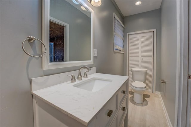 spare room featuring a textured ceiling, a ceiling fan, baseboards, and carpet