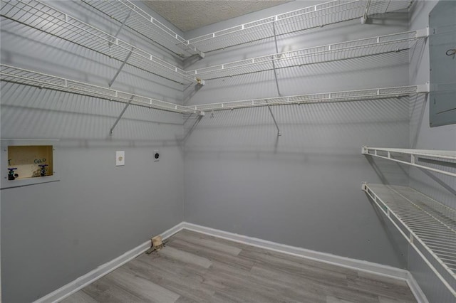 bathroom with vanity, toilet, and baseboards