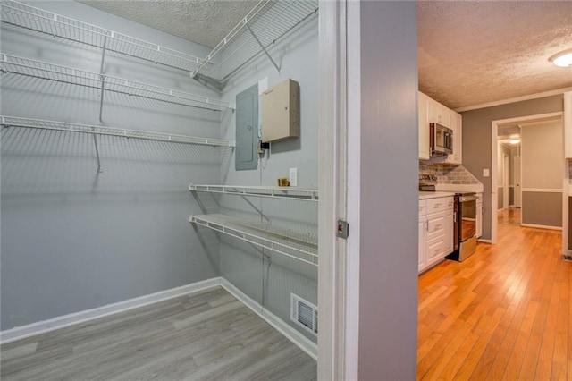 full bathroom with a stall shower and vanity