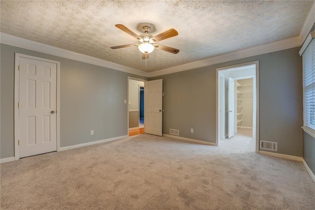 bathroom with toilet, crown molding, shower / bath combination, and vanity