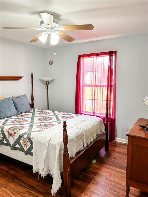 3809 Autumn View Ln NW, Acworth, GA 30101 - bedroom with wood finished floors and ceiling fan
