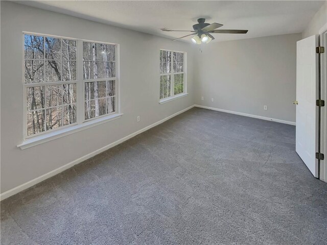 6941 Gallant Cir SE Unit 10, Mableton, GA 30126 - unfurnished room with baseboards, ceiling fan, and dark carpet