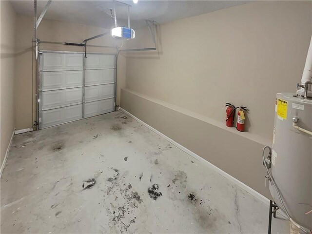 6941 Gallant Cir SE Unit 10, Mableton, GA 30126 - garage featuring water heater and a garage door opener