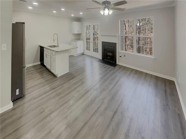 6941 Gallant Cir SE Unit 10, Mableton, GA 30126 - kitchen with light countertops, a sink, dishwasher, ceiling fan, and freestanding refrigerator
