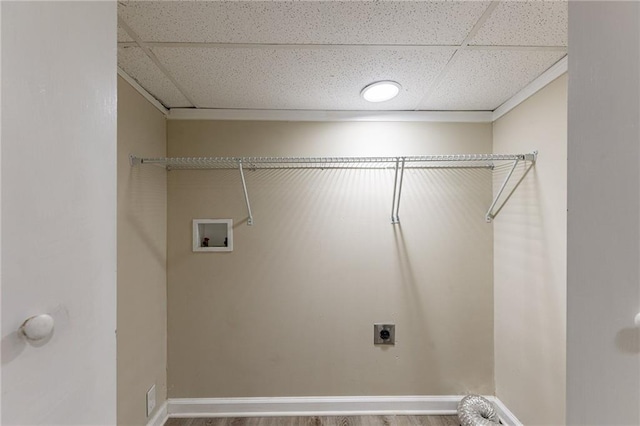 washroom featuring hookup for an electric dryer, hookup for a washing machine, and hardwood / wood-style flooring