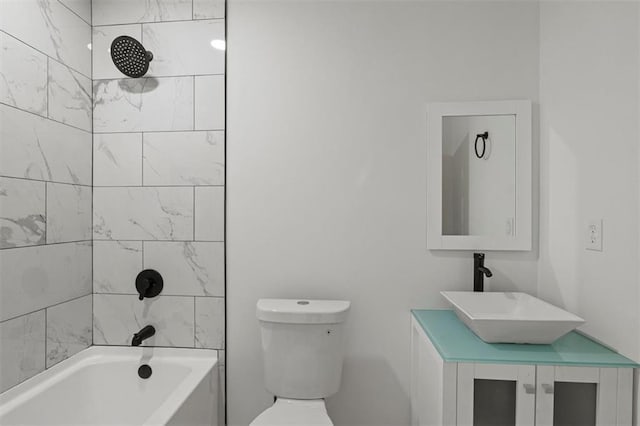 full bathroom featuring toilet, vanity, and shower / bathtub combination