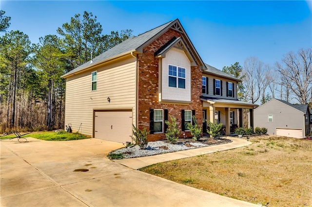 view of front of property with brick siding, concrete driveway, and an attached garage