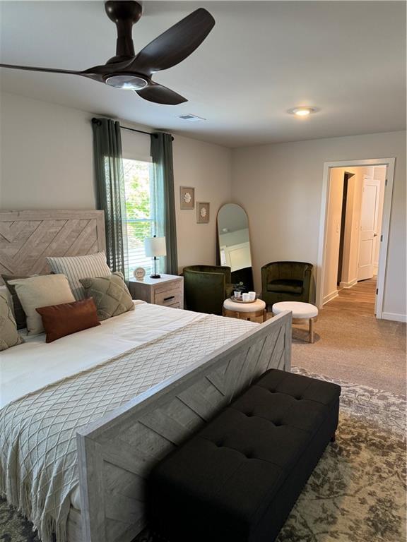 719 Windstream Dr, Lagrange, GA 30241 - bedroom with carpet floors, ceiling fan, and baseboards