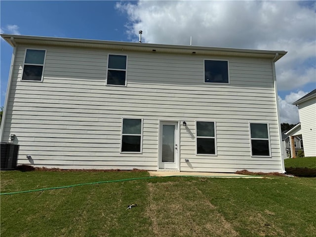 719 Windstream Dr, Lagrange, GA 30241 - rear view of property featuring cooling unit and a yard