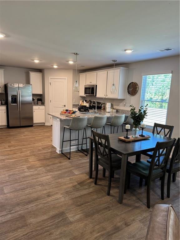 719 Windstream Dr, Lagrange, GA 30241 - dining room featuring dark wood-style floors and recessed lighting
