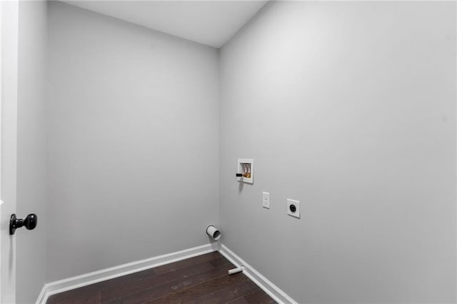 laundry area with hookup for a washing machine, hookup for an electric dryer, laundry area, baseboards, and dark wood-style floors