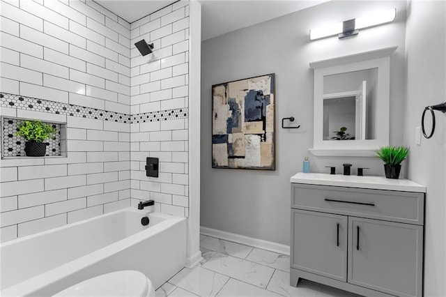 full bathroom with toilet, vanity, bathing tub / shower combination, baseboards, and marble finish floor