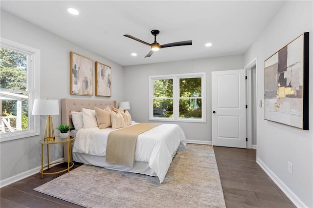 bedroom featuring recessed lighting, baseboards, and wood finished floors