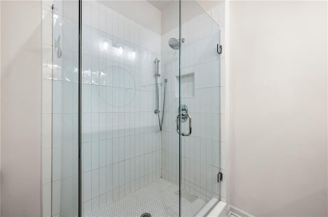 bathroom with a stall shower