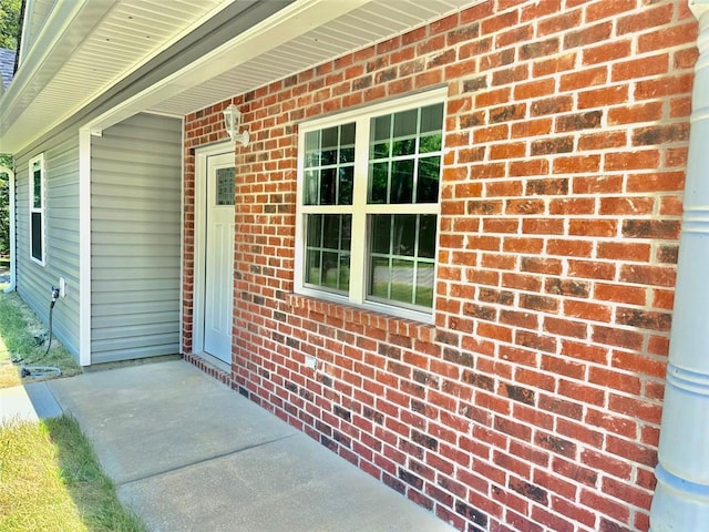 property entrance with covered porch