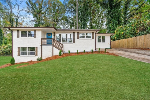 view of front of property with a front lawn