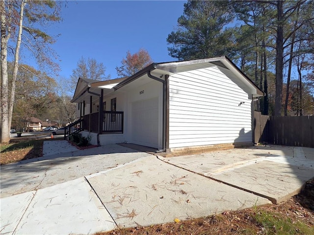 view of property exterior featuring a garage