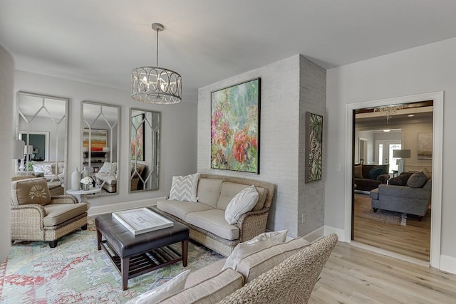 2623 Lindsey Grace Ln, Buford, GA 30519 - living room with light wood-style floors and a chandelier