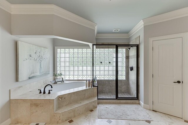 2623 Lindsey Grace Ln, Buford, GA 30519 - bathroom with a bath, plenty of natural light, a shower stall, ornamental molding, and baseboards