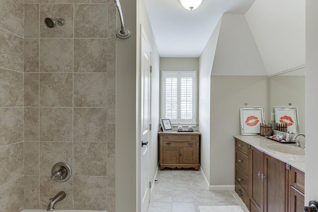 2623 Lindsey Grace Ln, Buford, GA 30519 - bathroom with vanity, tile patterned floors, and baseboards