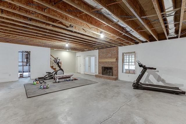 2623 Lindsey Grace Ln, Buford, GA 30519 - exercise room with a brick fireplace